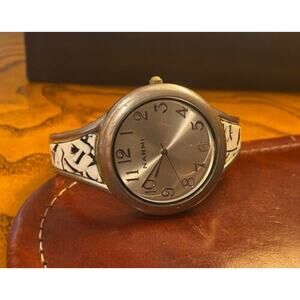Women's Silver Tone Narmi Bangle Bracelet Watch with Black and White Enamel Acce